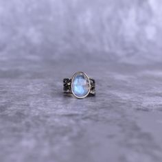 ✦ Introducing our Rose Cut Oval Shaped natural Moonstone ring: a beacon of new beginnings and cosmic beauty.  Known as the "Stone of New Beginnings," it radiates transformative energy, perfect for the free-spirited bohemian. A heartfelt gift for loved ones embarking on a journey of self-discovery. Embrace the ethereal allure of this mesmerizing gemstone, adding a touch of magic to your everyday look. 💎  Please Note As with all Natural Gemstones The colors and inclusion patterns if applicable may vary slightly. -- -- »» DETAILS -  Gemstone -  Moonstone Metal - 925 Sterling Silver  -- -- »» $ BU Y * M O R E * S A V E * M O R E $ «« ✦ Special 25% OFF when you order 2 items!! Apply Coupon Code: SAVEMORE25 ✦Special 30% OFF when you order 3 or more items!! Apply Coupon Code: SAVEMORE30 -- -- C Moonstone Gemstone Stackable Rings As Gift, Moonstone Stackable Rings For Gifting, Ethereal Silver Moonstone Ring Gift, Bohemian Moonstone Crystal Ring With Birthstone, Mystical Sterling Silver Moonstone Birthstone Ring, Mystical Moonstone Birthstone Ring Gift, Handmade Moonstone Crystal Ring For Promise, Moonstone Open Ring With Moon Phase For Gift, Ethereal Birthstone Rings For Gifts