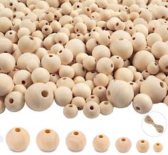 several wooden beads are arranged on a white surface with holes in the middle to make them look like they were made out of wood