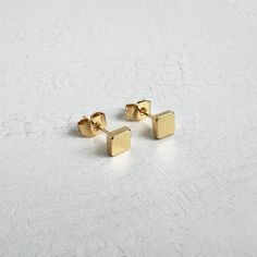 Simple and sophisticated, our geometric stud earrings are beautifully plated in 18k gold and perfect for everyday wear. · 18k gold plated brass · Push back closure · 5x5mm Square Stud Earrings, Geometric Studs, Square Earrings Studs, Square Stud, Gems Jewelry, Minimalist Earrings, Gold Studs, Gold Earrings Studs, Jewelry Earrings Studs