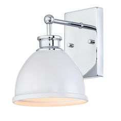 a white light fixture on a wall with a round shade over the bulb and arm