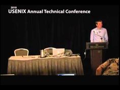 a man standing at a podium in front of a screen with the words usenix annual technical conference