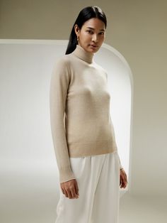 This light and soft regular fit sweater epitomizes luxury with the finest fibers of premium Mongolian cashmere, ensuring a flawless combination of classic design and style, is an essential piece for base layering. Lily Silk, Winter Products, Camisole Set, Cable Knit Turtleneck Sweater, Silk Knit, Oversize Fashion, Sweater For Women, Cashmere Turtleneck, Knitwear Tops