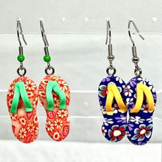 Add a touch of summer fun to your everyday look with these adorable handmade tiny little flip flop sandal dangle earrings! These charming earrings are perfect for beach lovers and those who enjoy adding a whimsical touch to their outfit. Crafted with care and attention to detail, these earrings are sure to bring a smile to your face every time you wear them. Whether you're heading to the beach or just want to add a pop of summertime style to your ensemble, these earrings are the perfect choice. Earrings Summer, All Things Cute, Beach Lovers, Flip Flop, Flip Flop Sandals, Everyday Look, Summer Fun, Jewelry Earrings Dangle, Flip Flops