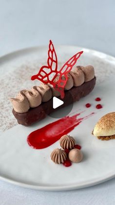 a white plate topped with desserts on top of a table