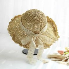 Stay cool and stylish with our natural straw hat, designed with a wide brim and scalloped edge for excellent sun protection. The lightweight and breathable material, combined with an open weave pattern, ensures maximum airflow to keep you comfortable. A delicate lace ribbon bow adds an elegant touch, while the adjustable inner band offers a secure and perfect fit. Ideal for beach outings, garden parties, and picnics, this hat provides both functionality and a feminine look for any summer occasio Hat With Bow, Gardening Hat, Summer Straw Hat, French Women Style, Straw Hat Beach, Tie For Women, Personalized Hats, Summer Hats For Women, Sun Hats For Women