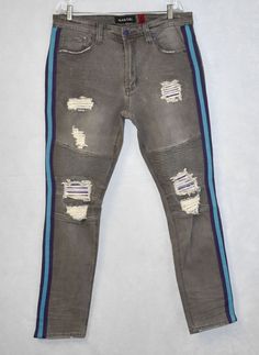 NEW AUTHENTIC MAKOBI  Gray Distressed Side Striped Denim  Biker Jeans  Brand: MAKOBI Material(s): 98% Cotton 2% Spandex Color(s): Gray Made in: China, Designed in USA Condition: New W/O Tags, store sample-display Size: 36 x 32 (Please check measurements) Measurements (approx): Waist 36.5", Inseam 33", Rise 11", Leg opening (flat cross) 7"                                               NOTE: Please refer to the pictures for item condition and style. Due to the difference between different monitors Gray Ripped Cotton Jeans, Gray Distressed Denim Jeans, Sample Display, Red Runway, Striped Denim, Biker Jeans, Jeans Material, Side Stripe, Jeans Brands