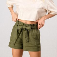 50% Linen / 50% Rayon Inseam: 2.5 Inches Length: 14 Inches Trendy Khaki Shorts For Spring, Trendy Green Bottoms With Paperbag Waist, Trendy Khaki Shorts For Summer, Casual Paperbag Waist Shorts For Spring, Spring Paperbag Waist Shorts, Green Paperbag Waist Bottoms For Spring, High Waist Khaki Shorts For Summer, Summer Khaki Bottoms With Paperbag Waist, Green Paperbag Waist Shorts For Spring