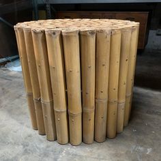 a bunch of bamboo sticks stacked on top of each other