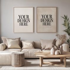 a living room with two posters on the wall and a coffee table in front of it