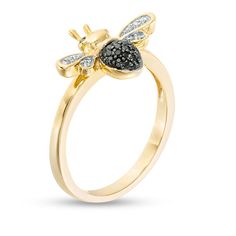 Abuzz with excitement, this diamond bumblebee ring is a look she’ll want to wear often. Crafted in sterling silver with 14K gold plate, this charming design features a body filled with alluring enhanced black diamonds, sparkling white diamond wings, and black diamond eyes. Radiant with 1/10 ct. t.w. of diamonds and a brilliant buffed luster, this ring is a delightful touch. Sterling silver rings cannot be resized after purchase. Bumble Bee Ring, Bee Ring, Diamond Eyes, Peoples Jewellers, Black Diamonds, Bumble Bee, Black Diamond, White Diamond, Design Features