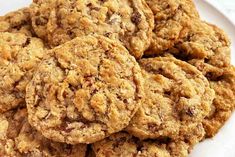 a white plate topped with cookies on top of a table