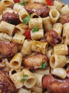 pasta with sausage and peppers in a bowl