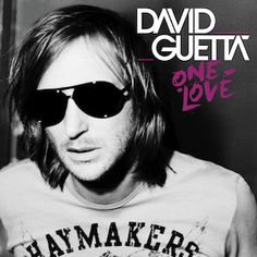 a man wearing sunglasses and a t - shirt with the words, david guetta on it