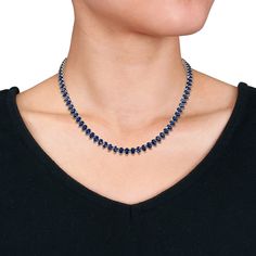 Express your sophisticated style with this elegant pear-shaped blue lab-created sapphire tennis necklace in silver. Fashioned in sterling silver This design glistens with a vibrant row of 6.0 x 4.0mm pear-shaped bright blue lab-created sapphires. This choice adds a pop of color to your attire. The 18.0-inch necklace secures with a tongue and groove clasp. Elegant Blue Tennis Necklace As A Gift, Elegant Blue Tennis Necklace As Gift, Elegant Blue Tennis Necklace For Gift, Sapphire Tennis Necklace, Peoples Jewellers, Necklace Clasps, Silver Prices, Tennis Necklace, Tongue And Groove