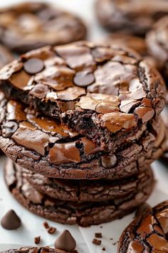 a pile of chocolate cookies sitting on top of each other