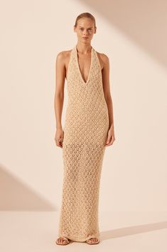 Chic Backless Crochet Dress For Vacation, Chic Crochet Maxi Dress, Elegant Beige Halter Dress For Beach, Elegant Beige Halter Dress For The Beach, Beige Maxi Dress For Beach Cover-up, Chic Backless Crochet Dress For Spring, Beige Crochet Maxi Dress For Beach, Chic Beige Maxi Length Crochet Dress, Chic Beige Crochet Maxi Dress