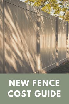 a white fence with the words new fence cost guide on it in front of trees