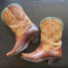 "Vintage 1940s Peewee cowboy boots in rare tri-colorway of dark leather, tan leather, and robin's egg blue leather piping * Great vintage condition; structurally sound, supple leather, light wear expected with antique boots like these, have been resoled  Fit a size 5.5-6 US Outsole: 9 3/4\" Insole: 9\" Width: 3.5\" Heel height: 2\" Height: 11\" ---- All vintage items have been described and dated to the best of my ability. With this said, all dates are approximations unless there is specific documentation of period (such as Union tag or provenance). Although I am very confident in my abilities to date items, there is no way to promise 100% accuracy at all times, as styles, fabrics, and construction often overlap decades. Please keep this in mind prior to purchasing.   All vintage items are Western Style Boots With Patina For Western-themed Events, Vintage Brown Boots For Western-themed Events, Rustic Vintage Brown Boots For Ranch, Vintage Snip Toe Boots For Ranch, Vintage Snip Toe Ranch Boots, Retro Brown Boots With Leather Sole, Western-styled Patina Boots With Round Toe, Round Toe Boots With Patina For Western-themed Events, Western-themed Boots With Patina And Round Toe