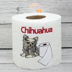 a white roll of toilet paper with a dog on it and the word chihuahua written in red