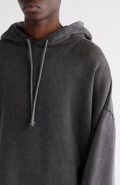 A reflective logo patch centers the back of this hoodie cut in a relaxed fit with roomy dropped shoulders and finished with a heavy garment-dyed finish. 24" length (size Medium) Drawstring hood Ribbed cuffs and hem 100% organic cotton Machine wash, line dry Made in Portugal Distressed Washed Black Hoodie Relaxed Fit, Distressed Washed Black Hoodie In Relaxed Fit, Washed Black Distressed Hoodie Relaxed Fit, Streetwear Washed Black Hoodie With Ribbed Cuffs, Washed Black Hoodie With Ribbed Cuffs For Streetwear, Faded Hoodie Sweatshirt With Drawstring Hood, Faded Hoodie For Streetwear, Faded Hooded Hoodie For Streetwear, Faded Urban Hoodie Sweatshirt