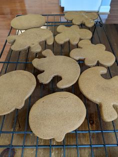 some cookies are cooling on a rack in the kitchen and ready to be baked or eaten