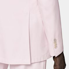 Available exclusively online, this pink suit's jacket is cut to a tailored fit with a natural shoulder. The flat-front trousers are cut with a straight leg and feature side adjusters. Pink Suits With Welt Pockets For Spring, Pink Fitted Double Breasted Suit With Notch Lapel, Pink Fitted Double Breasted Business Suit, Tailored Pink Blazer With Hidden Button Closure, Luxury Pink Blazer With Lapel Collar, Fitted Pink Outerwear For Business, Pink Office Blazer With Welt Pockets, Pink Fitted Business Outerwear, Pink Fitted Outerwear For Business