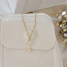 Height: 14.8mm Width: 6.1mm Thickness: 2mm Bail opening: 2.0mm Stone material: Available in Genuine diamond or clear cubic zirconia Stone shape: round cut Total number of stones: 15 Stone setting: prong Metal: Solid 14K Yellow Gold Finish: high polish Delicate Diamond Necklace With Flower Charm, Dainty 14k Gold Diamond Necklace With Flower Pendant, Dainty Diamond Necklace With Flower Charm, Flower Shaped Diamond Necklace For Gift, Minimalist White Gold Necklace With Flower Charm, Delicate Yellow Gold Flower Pendant Necklace, Gift Diamond Necklace With Delicate Flower Pendant, Diamond Necklace With Delicate Flower Pendant As Gift, Diamond Necklace With Flower Pendant As Gift