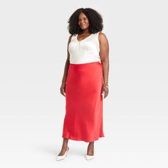 Dress up for brunches, lunches or dinners in chic style with this Maxi Slip Skirt from A New Day™. This maxi-length slip skirt is made from lightweight satin fabric for all-day comfort, while the full elastic waistband lends a secure fit. Tailored in a high-rise silhouette with a slim fit for a flattering look, you can pair this skirt with your fave tops and footwear for versatile ensembles. A New Day™: Style that goes wherever you do. Elegant Red Maxi Skirt For Spring, Chic Rayon Skirt For Brunch, Red Relaxed Fit Maxi Skirt For Vacation, Red Satin Skirt For Summer, Chic Red Lined Maxi Skirt, Red Silk Summer Skirt, Red Chic Relaxed Maxi Skirt, Red A-line Maxi Skirt For Summer, Red Satin Skirt