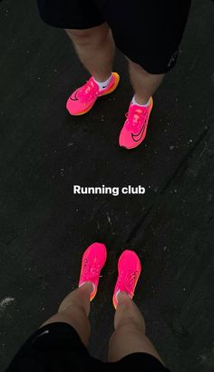 two people standing next to each other with pink shoes on their feet and the words running club above them