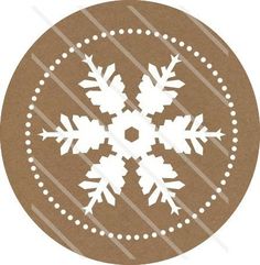 a brown and white snowflake on a circle with dots in the center,