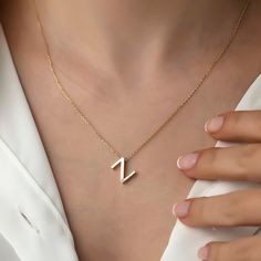 14k Gold Minimal Z Letter Necklace, Letter Necklace, Gold Necklaces, 14k Gold Necklace, Necklace for Love, Necklace for Name ITEM DETAILS ❆ All our jewelleries are handmade with Love and Care 💓 ❆ Material: 14K Gold. ❆ Gram: 2,00 gr ❆ Each item is made to order. Since all of our products are handmade, there may be -) 10% deviation in the specified weight. ❆ DO YOU LIKE THIS RING? You can get more information about it below but if you have any questions, just send a message. PACKAGING ❆ They are Z Necklace, Letter Necklace Gold, Z Letter, 14k Gold Necklace, Gold Necklaces, Gold Piece, Cute Rings, Letter Necklace, Favorite Rings