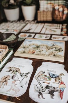 there are many animal pictures on the table