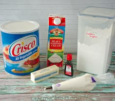 ingredients to make strawberry shortcakes sitting on a table