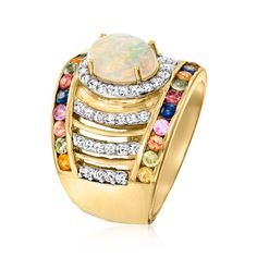 Ross-Simons - Opal Ring, 1.30ct t. w. Multicolored Sapphires, .60ct t. w. White Zircon Over Sterling. Size 9. On this stunning ring, a 9x7mm oval opal cabochon flickers a fantastic play of color that beautifully complements the many hues of its 1.30 ct. t. w. round multicolored sapphire borders. Also features the bright glow of .60 ct. t. w. round white zircon stripes in polished 18kt yellow gold over sterling silver. 5/8" wide. White zircon, multicolored sapphire and opal ring. Opal birthstones October Birthdays, Opal Birthstone, Ring Opal, Opal Ring, Opal Rings, Borders, Opal, Sapphire, Size 7