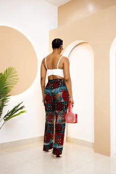 PRODUCT DETAILS: Designed in the U.S., hand-crafted in Africa Delivery within 2 weeks Print shown in multi-color These classy high waist pants, designed with African Ankara print and side pockets, are what you need to impress in that next business meeting or even out to brunch with friends! Model is 5'9 FABRIC CARE: Dry Clean. Hand Wash. Machine Wash. SIZE CHART: Brunch With Friends, Ankara Dresses, Ankara Print, African Ankara, High Waist Pants, Business Meeting, Waist Pants, Dance Outfits, High Waisted Pants