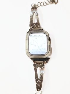 This listing is for ONE handmade sterling & fine silver Apple WatchBand ONLY. There is NOT A WATCH INCLUDED. Personalization is not included in this price.   Interested in adding your name, initials, or date? Please see this listing and add it to your cart! https://www.etsy.com/listing/1502566904/personalize-your-watch-band-personalize?  What sets my Apple Watch Bands apart from the others is I use quality materials.  *I used Fine Silver metal clay with my pretty Fleur di lis pattern.  *Oxidized Luxury Adjustable Silver Watch, Adjustable Silver Bracelet Apple Watch Band, Adjustable Silver Bracelet Strap Apple Watch Band, Silver Metal Bracelet Strap Apple Watch Band, Adjustable White Gold Watch With Bracelet Strap, White Gold Watches With Adjustable Bracelet Strap, Handmade Adjustable Silver Apple Watch Band, Silver Apple Watch Bracelet Strap Band, Silver Bracelet Strap Apple Watch Band