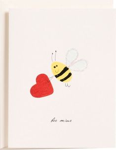 a card with a drawing of a bee holding a heart on it's back