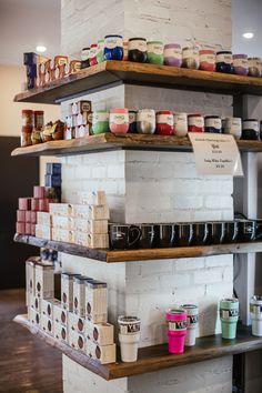 the shelves are filled with different types of food