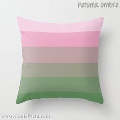 a pink, green and grey pillow sitting on top of a white wall with the words lett - puffed ombre