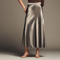 Beautiful And Timeless Satin Effect Midi Skirt By Zara In Size Medium In Taupe 100% Viscose Fabric Is Soft And Shiny Giving The Skirt An Elegant Appearance. Skirt Contains Side Zipper Enclosure Versatile And Can Be Dressed Up Or Down. Wear With A T-Shirt Or Tank And Sandals. Or Dress Up For A Party Or Night Out. Measurements: Waist: 28-29" Length: 37" Ships From Smoke And Pet Free Home. Silk A-line Skirt With Relaxed Fit, Silk A-line Relaxed Skirt Bottoms, Elegant Full Length Lined Skirt, Zara Long Pleated Skirt, Elegant Full Length Solid Color Skirt, Elegant Full-length Spring Skirt, Elegant Full-length Skirt For Spring, Zara Evening Midi Skirt, Chic A-line Satin Bottoms