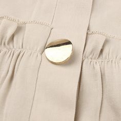 Apricot Button Pleated Long Sleeve Blouse Beige Single-breasted Button-up Top, Beige Button Closure Blouse For Spring, Spring Beige Blouse With Button Closure, Beige Blouse With Button Closure For Spring, Neutral Button-up Top With Buttons, Button-up Beige Blouse With Button Cuffs, Beige Button-up Blouse With Buttons, Khaki Button Closure Blouse For Spring, Chic Beige Tops With Snap Buttons