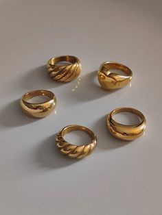 We offer chunky gold rings at affordable prices. Since chunky rings are so popular, I made a special collection for them. Large dome rings, chunky croissant rings, double dome rings, chunky love rings. As a beautiful stainless steel-based gold band, it lasts forever and will always look good. A single ring is stylish enough, but a couple does look very fancy together. ♥ SIGN UP for 10% OFF your first order: https://bit.ly/3olIlWf ♥ DETAILS - Materials: Stainless steel, 18k gold plating. - Nickel Bulky Rings Women, Chunky Jewelry Rings, Gold Thick Ring, Chunky Gold Rings Vintage, Gold Rings Thick, Thick Rings For Women, Classy Gold Rings, Chunky Gold Jewellery, Gold Rings Chunky