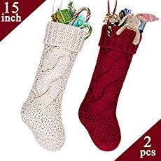 two christmas stocking holders are shown next to each other