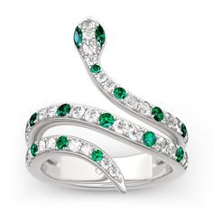 The snake is one of the oldest and most widespread mythological symbols, a symbol of transformation, rebirth and immortality. Crafted in sterling silver, the ring is set with glittering white stones as skin and decorated with green stones to add its spark. If you are interested in snake jewelry, just add this ring to your jewelrybox.Carat Weight: 2.579 ctStone Size: 2,1.8,1.5,1.3,1.5*3,1.3,1.5,1.8,2 mmStone Type: Jeulia® StoneNumber of Stones: 45 Stone Color: Diamond White, Emerald GreenStone Sh Slytherin Jewelry, Stile Harry Potter, Jewelry Knowledge, Harry Potter Jewelry, Snake Jewelry, Magical Jewelry, Snake Ring, Jewelry Outfit, Fantasy Jewelry