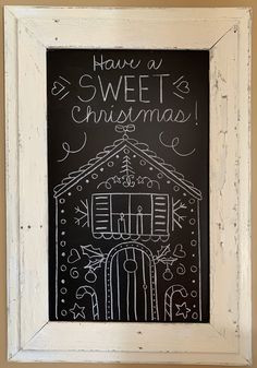 a chalkboard with the words have a sweet christmas written on it in white frame