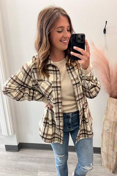 Gear up for autumn with the super cute Mocha Plaid Shacket. This adorable piece is perfect for transitioning into cooler weather, and its plaid pattern is a great neutral combo! Fit: True to size. Stephanie is wearing a medium in the photo. Medium is her true size. She’s 5'7", 36D and wears a 9 in Judy Blue. Soft Chest pockets Button front Material: 100% Polyester Measurement: Small: Bust: 42", Waist: 43", Hips: 45", Length: 17.5" Medium: Bust: 44", Waist: 45", Hips: 47", Length: 17.5" Large: Bu Plaid Shacket, Length Measurement, Blue Handbags, Comfy Clothes, Blue Soft, Capri Blue, Brown Plaid, Cooler Weather, Clothes Ideas