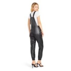 Sleek And Stylish, These Bb Dakota Steve Madden Pants Are A Must-Have For Every Fashion-Forward Woman. Designed In A Classic Black, These Faux Leather Overalls Offer A Unique Blend Of Comfort And Style In Xs Size. Brand: Bb Dakota Color: Black Size: Xs Style: Overalls Pattern: Solid Material: Faux Leather Features: Overalls Solid Made In China Size: Womens Xs Condition: New With Tags Black Bottoms Overalls For Night Out, Black Overalls For Night Out, Chic Black Jumpsuits And Rompers With Belt Loops, Black Overalls For Fall, Leather Overalls Women, Chic Black Faux Leather Jumpsuits And Rompers, Black Fitted Sleeveless Overalls, Chic Black Faux Leather Jumpsuit, Black Overalls With Adjustable Straps