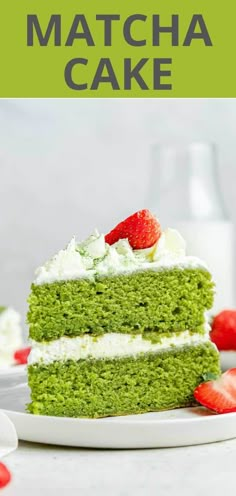 a slice of matcha cake on a plate with strawberries