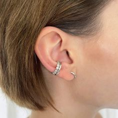 Metal: Recycled 925 Sterling Silver Plating : 18k Gold | Silver Rhodium Dimensions: Internal diameter 0.39" (10mm), External diameter 0.59" (15mm), Width 0.078" (2mm), Opening 0.15" (4mm) Earring Type: Standard Ear Cuff - no piercing required Matching Jewelry Available: See Full Standard Ear Cuff Collection A classic yet edgy statement to your ears this Slim Plain Ear Cuff is crafted from 925 sterling silver and comes available in 18k gold plating with a gleaming polished finish. All our cuffs b Huggie Earrings Silver, Ear Parts, Cuff Design, Latest Jewellery Trends, Silver Ear Cuff, Matching Jewelry, Latest Jewellery, Recycled Silver, Huggie Hoop Earrings