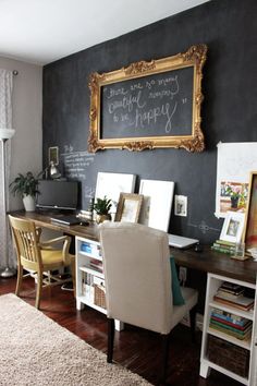 a chalkboard wall in the corner of a home office